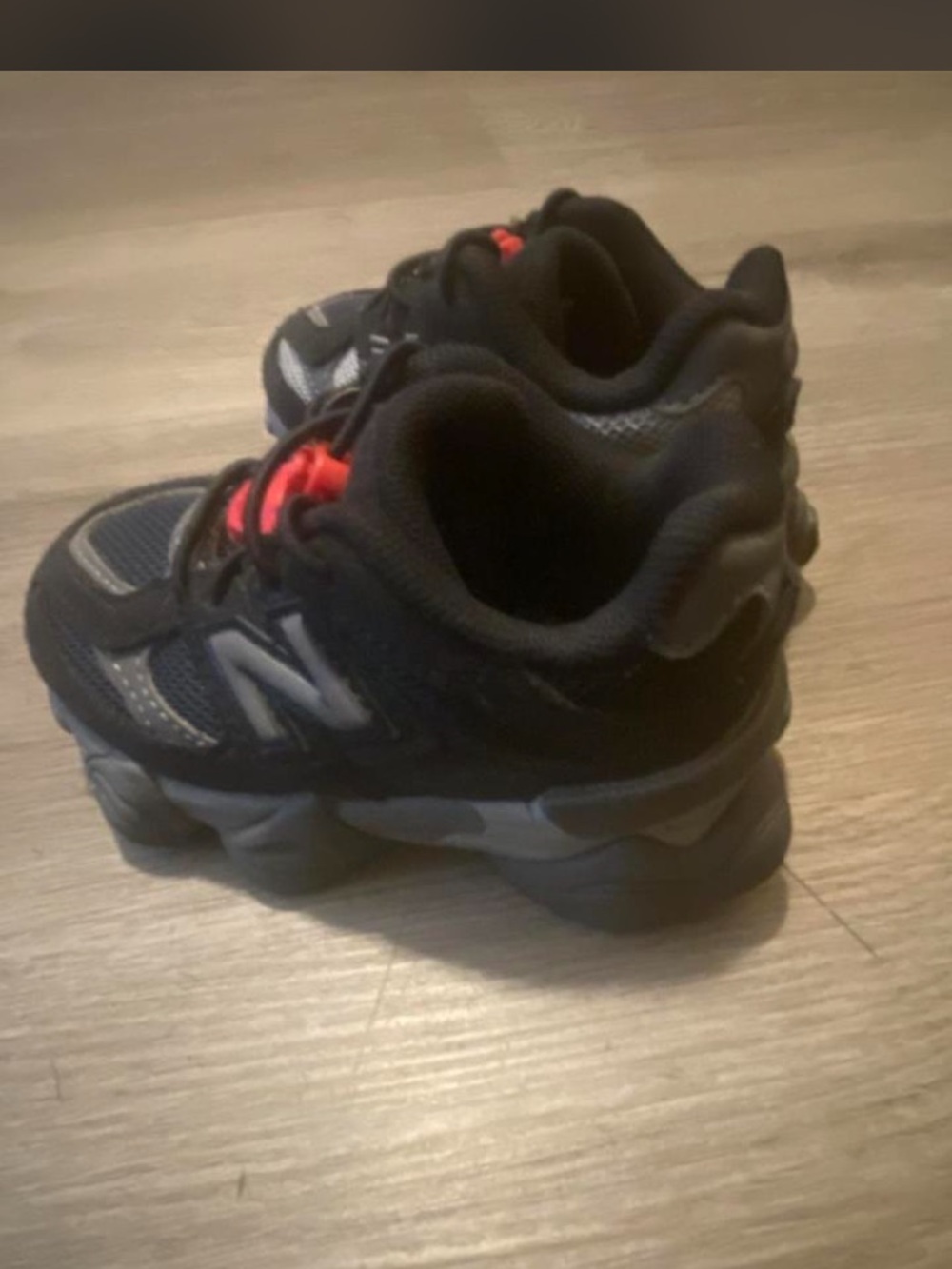 New Balance Kids Black Sneakers with Red Accent